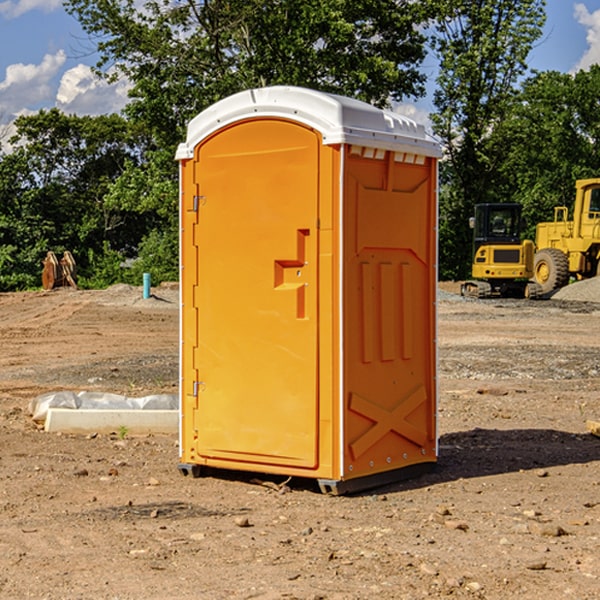 what is the cost difference between standard and deluxe portable restroom rentals in Perryman